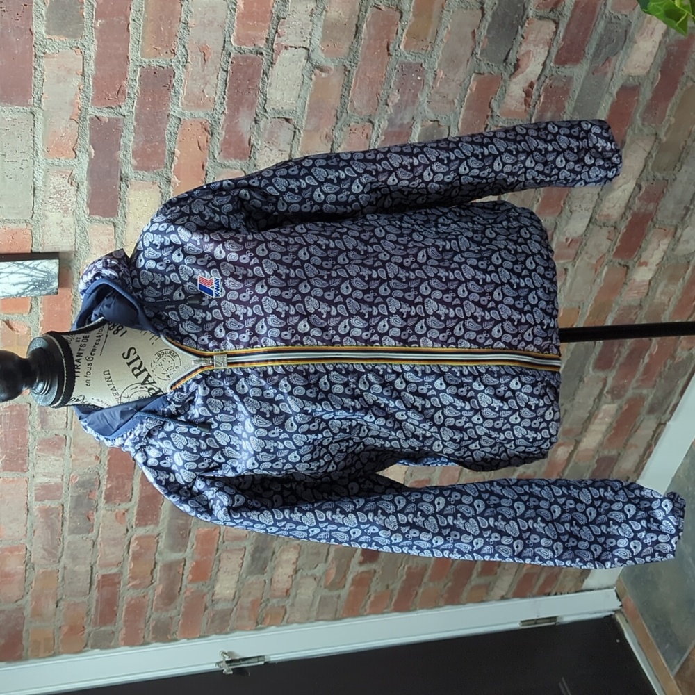 Reversible K-Way wind breaker.